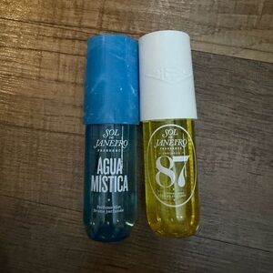 Sol de Janeiro Agua Mística (blue) & 87 Fragrance Mist (yellow)